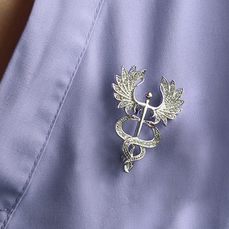 Wearing Big Wing Caduceus Silver and Crystal Lapel Pin
