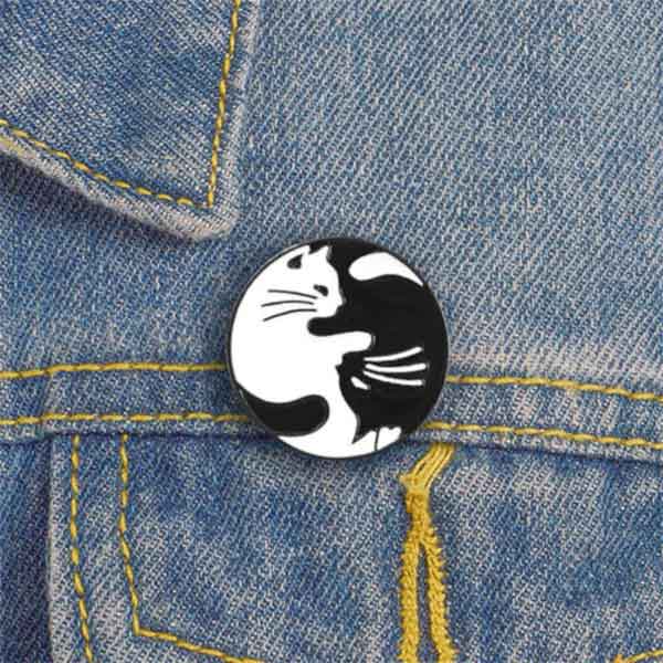 Cats B+W Enamel Lapel Pin on Denim