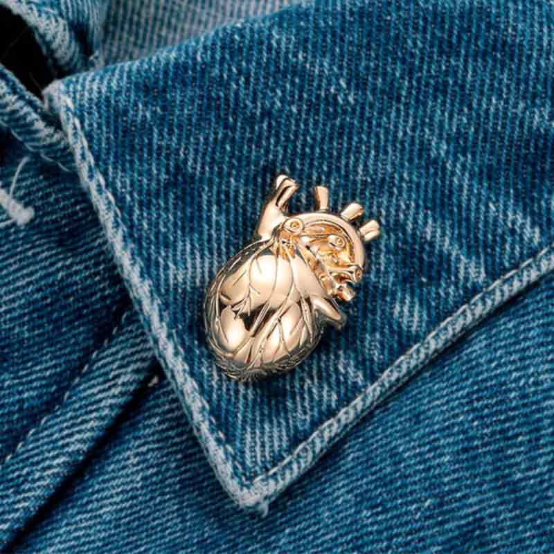 Wearing Gold Heart Lapel Pin
