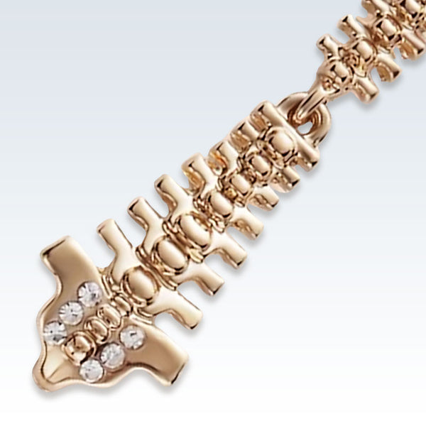 Gold Spine Lapel Pin Detail