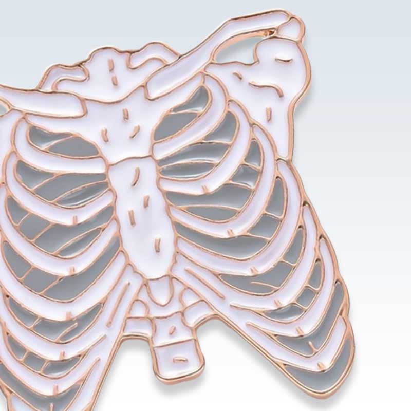 White Torso Anatomy Lapel Pin Detail